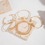 Elegantes Goldfarbenes Armband Set