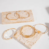 Elegantes Goldfarbenes Armband Set