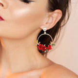 Elegante Goldohrringe mit Blumen