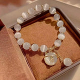 Perlenarmband mit Glückskatze Anhänger