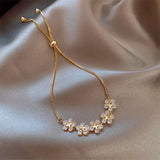 Kristall-Gänseblümchen-Armband in Goldfarben